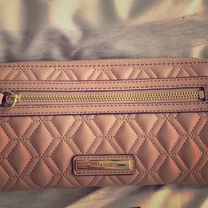 An Anne Klein barely used hand clutch